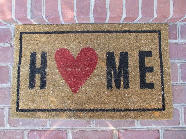 Home welcome mat with a red heart